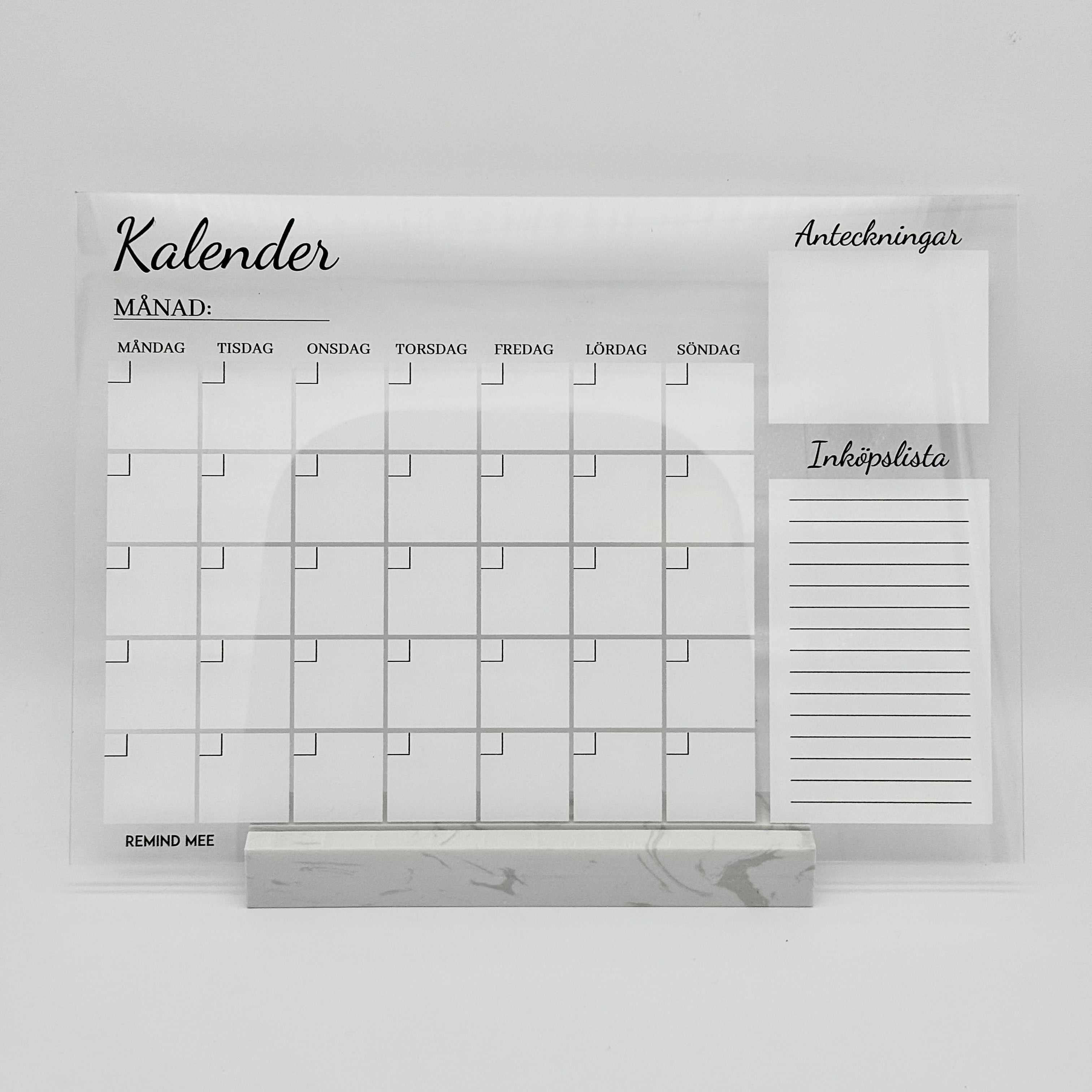 Månadskalender på marmorstativ