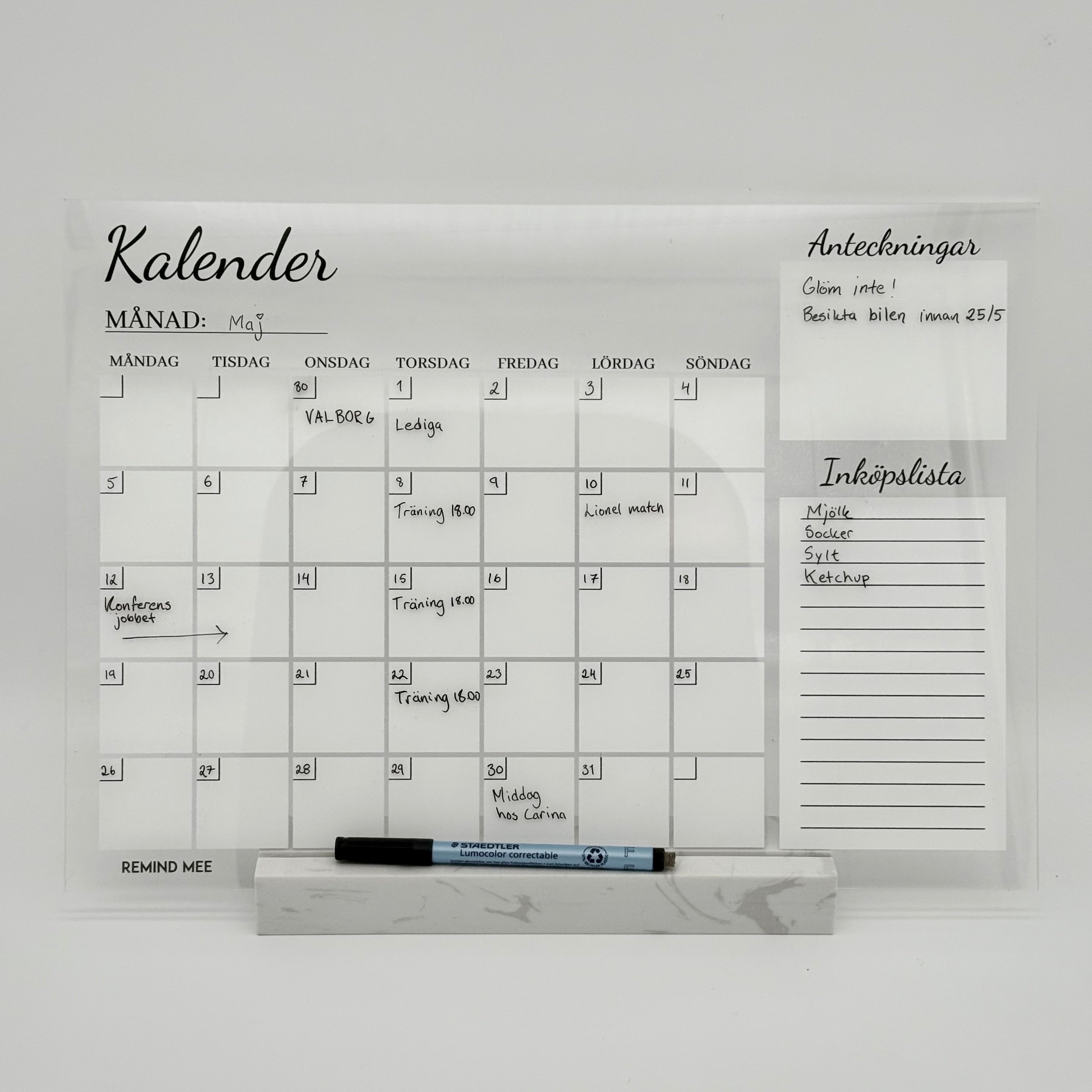 Månadskalender på marmorstativ